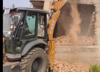 Action to remove a building under construction contrary to the permission