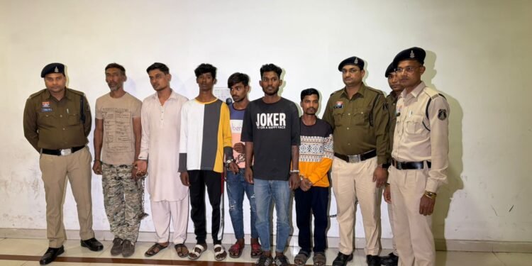 He was forcing people to sign land documents by holding them hostage; the police surrounded and arrested the accused.