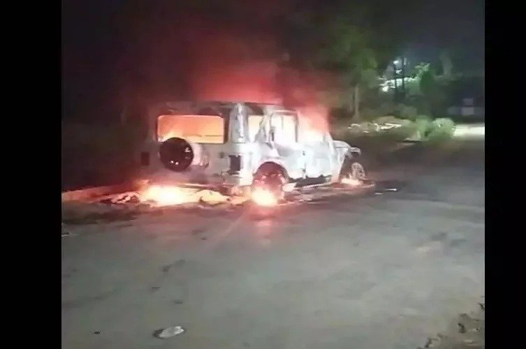 Miscreants set fire to a car parked outside a house, police investigating